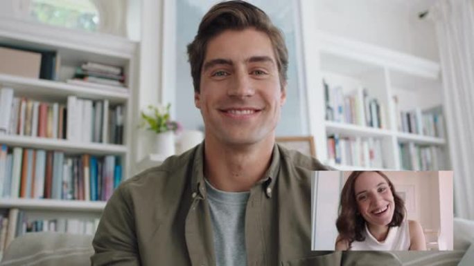 迷人的男人使用网络摄像头与女友视频聊天，微笑享受在线长途关系
