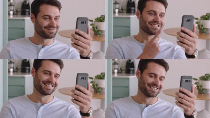 年轻的聋哑男子手持智能手机进行视频聊天，使用手语挥舞着享受手机上的连接聊天