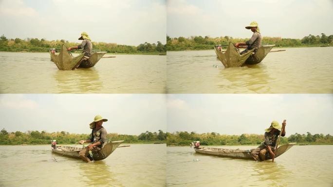 对虾渔夫诱饵网，将其放到更深处的河中，划船以获取新的渔获物
