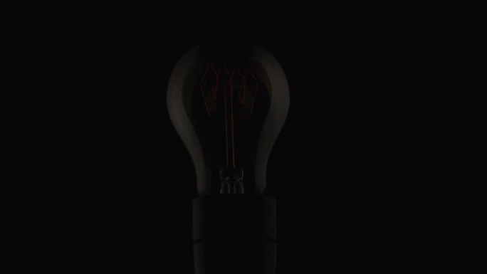 灯泡微亮的项目视频，节约电能因为价格高，概念单调朴素