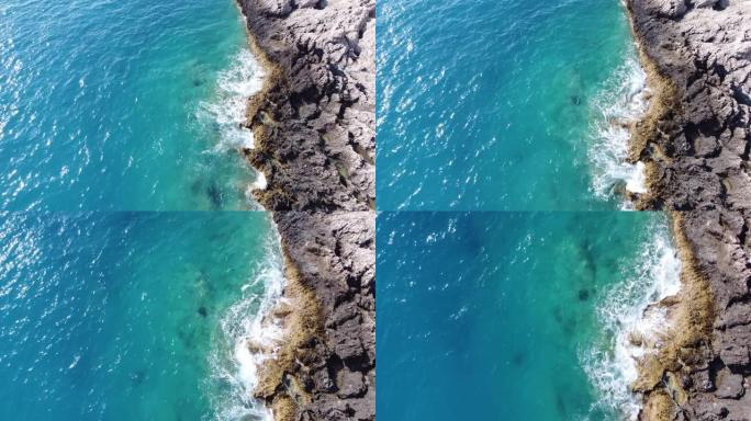 在Porto Katsiki海滩上触礁的大海鸟瞰图。莱夫卡达岛上夏季的热带绿松石海。