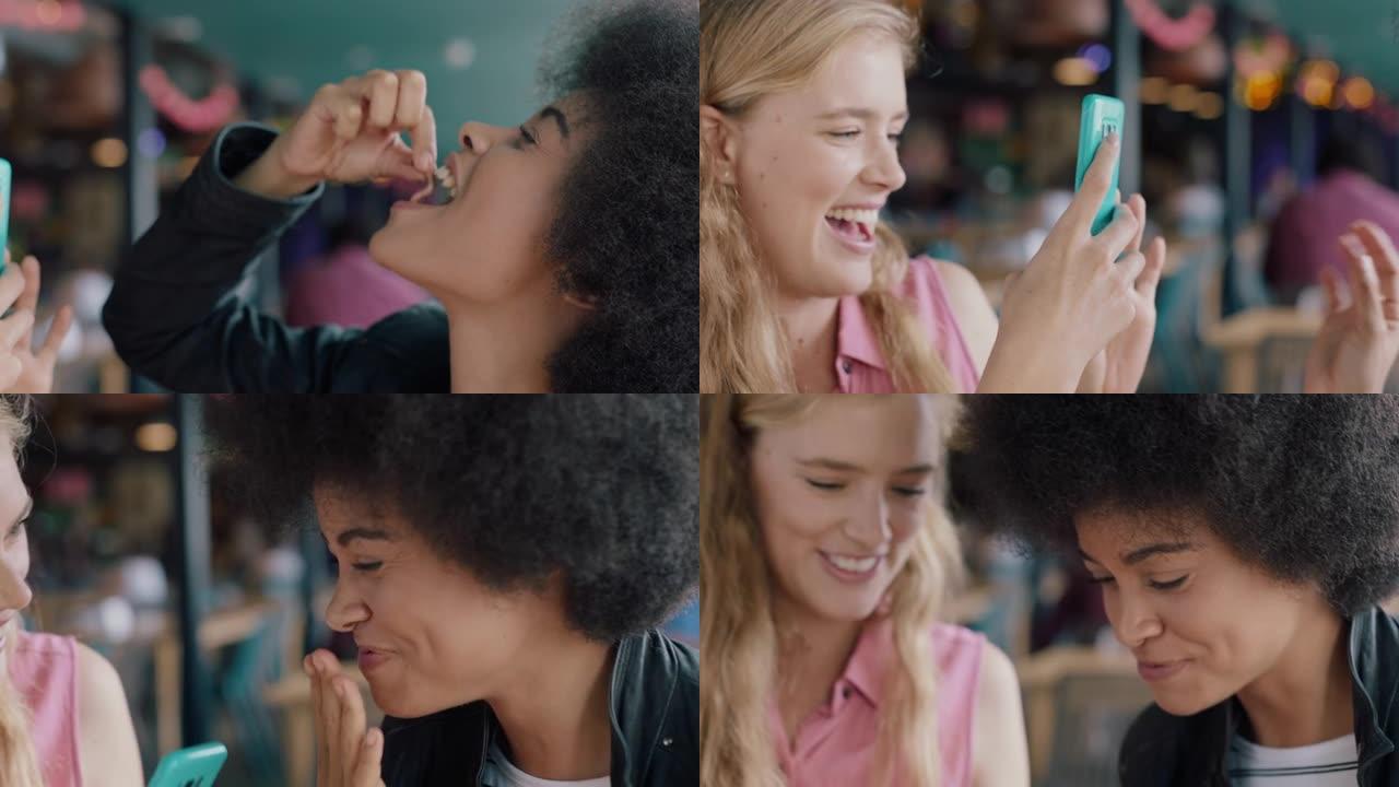 年轻的非洲裔美国妇女在餐厅和最好的朋友一起吃海鲜，使用智能手机拍照女孩朋友在社交媒体4k上一起分享周