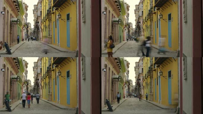人们走在古巴哈瓦那老城的街道上