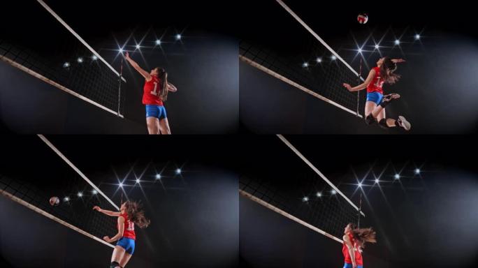 身穿红色球衣的SLO MO女子排球运动员跳空击球