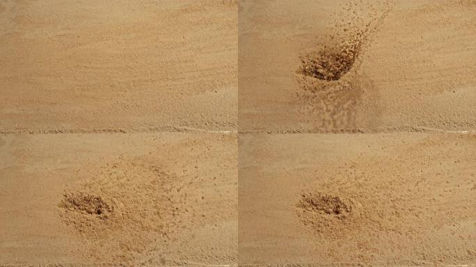 子弹击中地面时，SLO MO LD沙子散布到空中