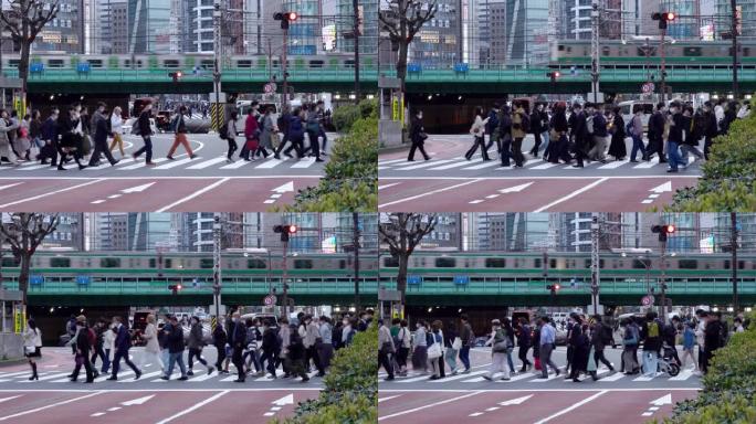 日本新宿东京人行横道街高峰时间，日落时间