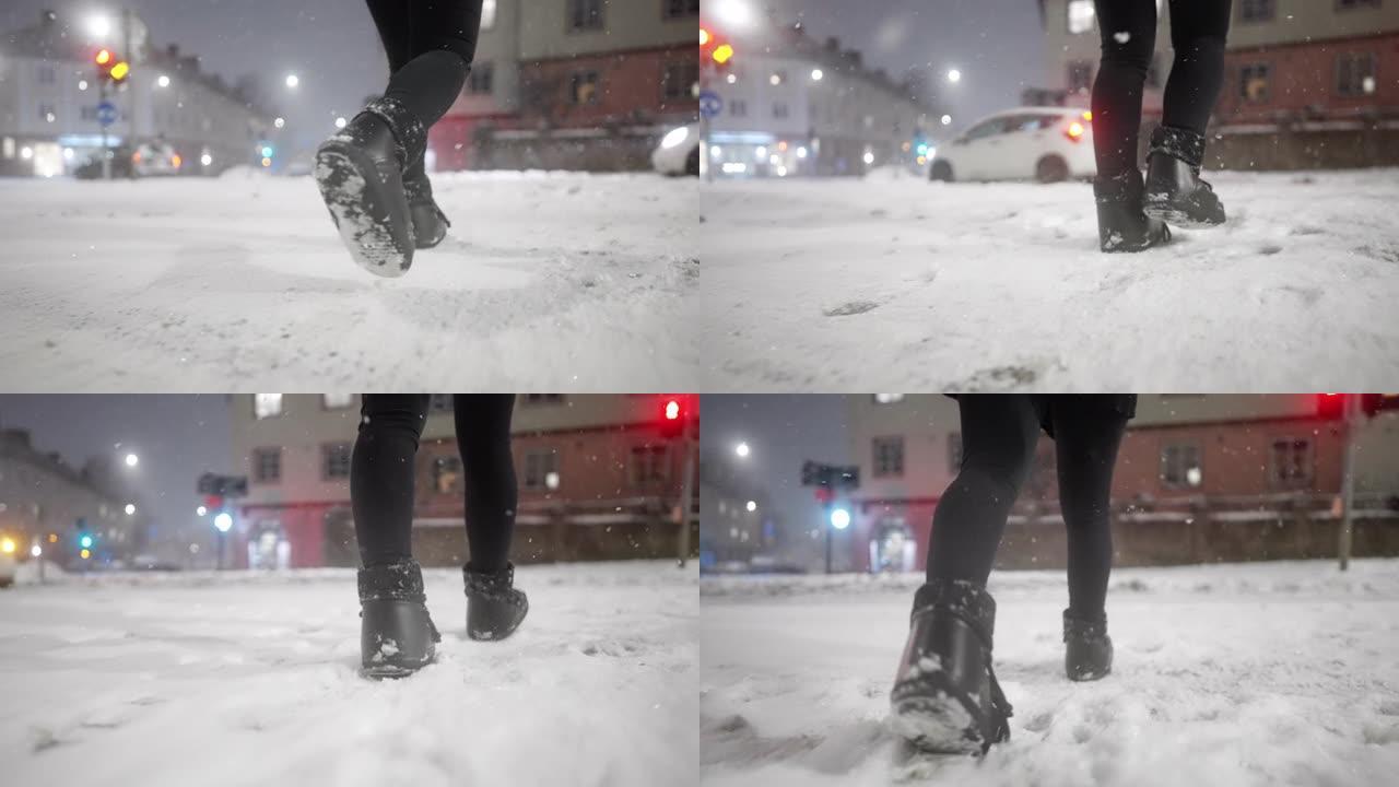 女人在暴风雪中过马路