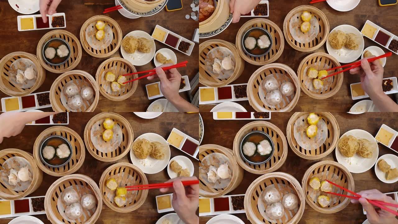 手筷子吃点心舒麦中国港式早餐食品蒸饺包馅