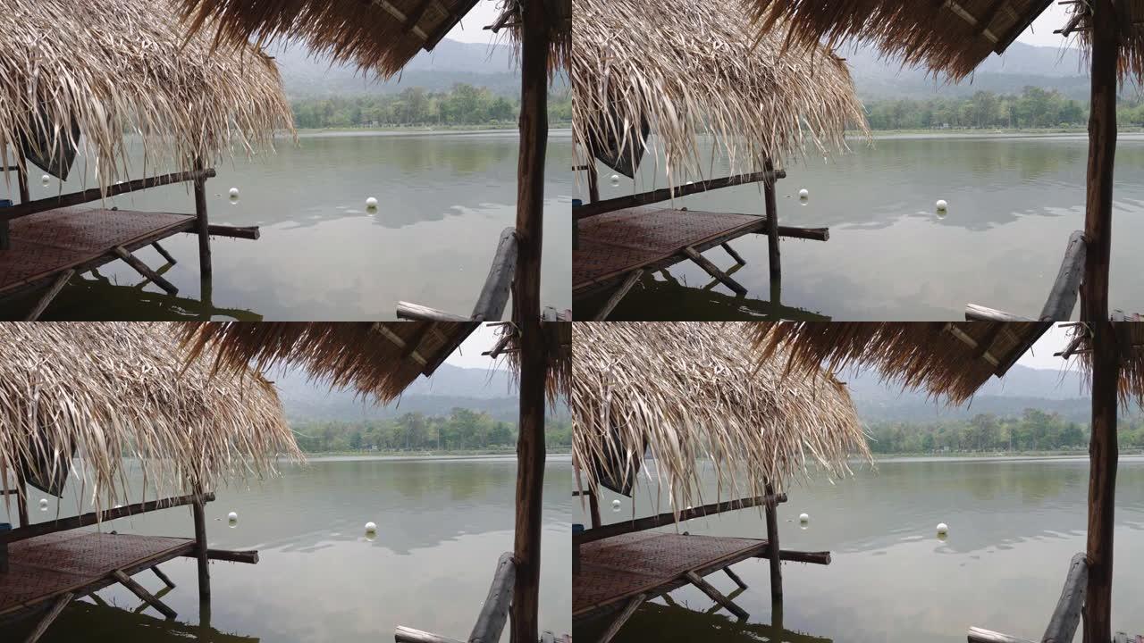 泰国清迈湖附近的芦苇屋顶小屋
