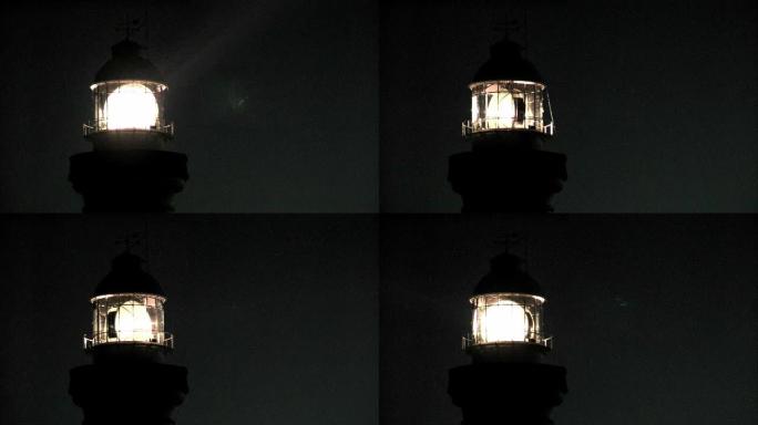 灯塔光将光束投射到夜空: 无缝循环