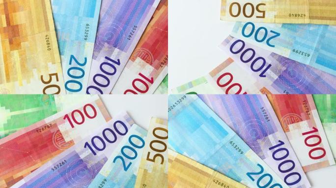 挪威货币轮换，金融和经济概念，所有克朗钞票，彩票，命运之轮，金融成功