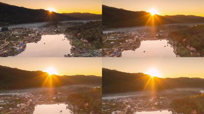 从空中无人机在泰国湄宏顺省班乐泰的雾蒙蒙的早晨天空中观看，泰国班乐泰村的中国村庄，放松旅行。