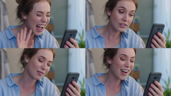 美丽的白人妇女使用智能手机进行视频聊天吹吻享受与挥手告别的朋友聊天