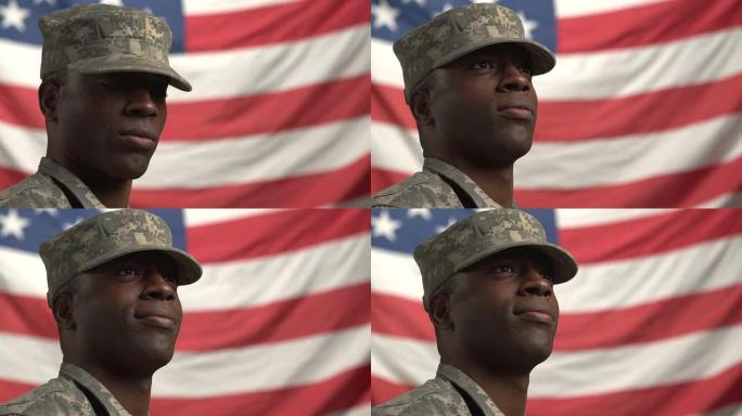 非裔美国男性士兵，站在美国国旗前