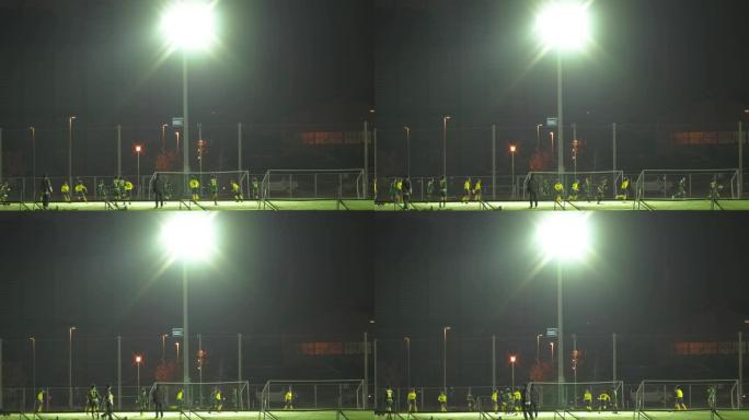 足球之夜在夜间的操场上进行比赛