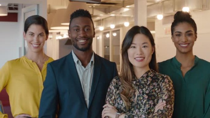 肖像商人微笑着多元化的公司员工团队，在现代创业公司中寻找快乐的成功企业家