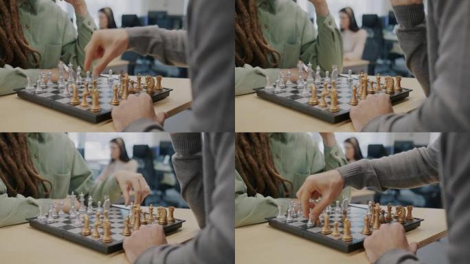 男女在办公室下棋的特写镜头享受工作休息