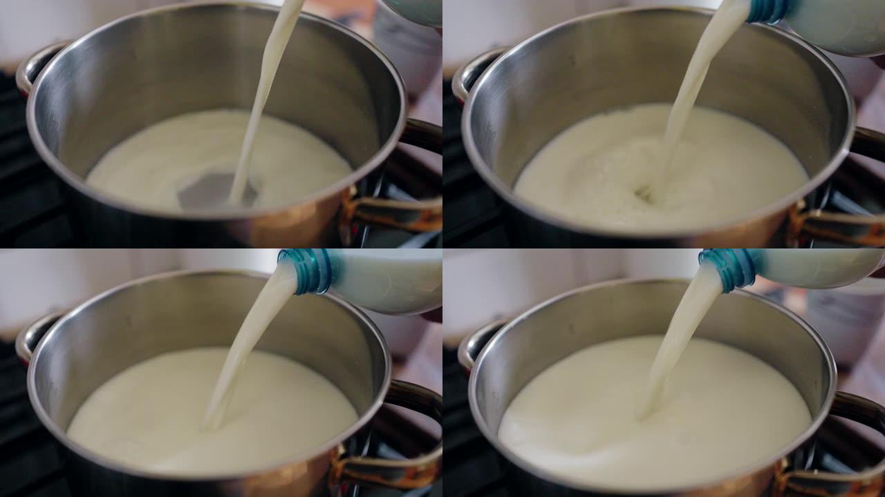 将水罐中的牛奶倒入平底锅中