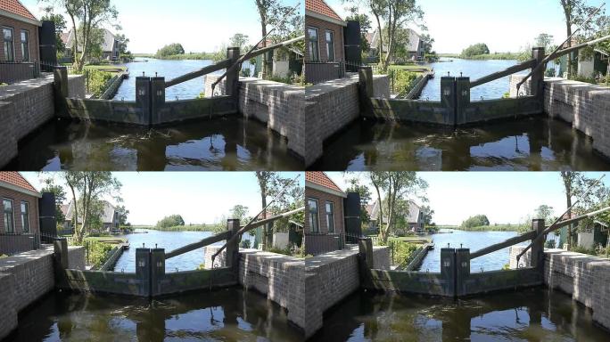 荷兰景观中的旧水坝和运河