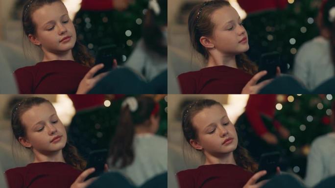 反社会的少女在家庭圣诞聚会上用智能手机发短信无聊的青少年对节日庆祝不感兴趣4k瘾