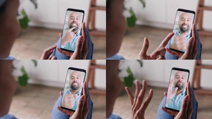 使用智能手机与聋哑男友视频聊天的年轻女子使用手语手势交流享受在线交流