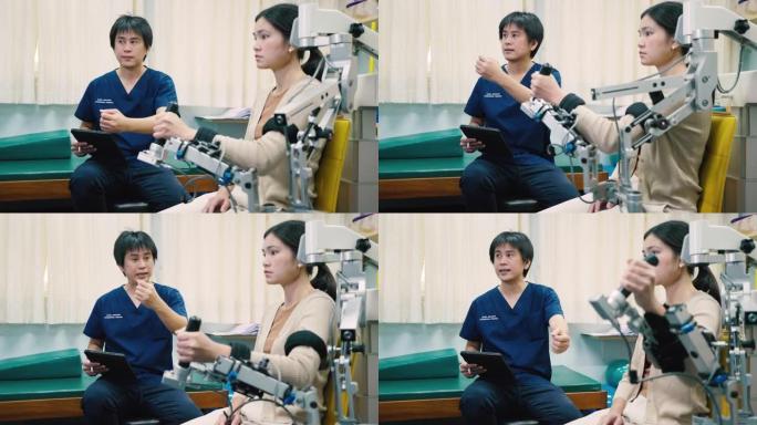 理疗师用机械臂照顾一名手臂虚弱的女性患者手臂虚弱康复。