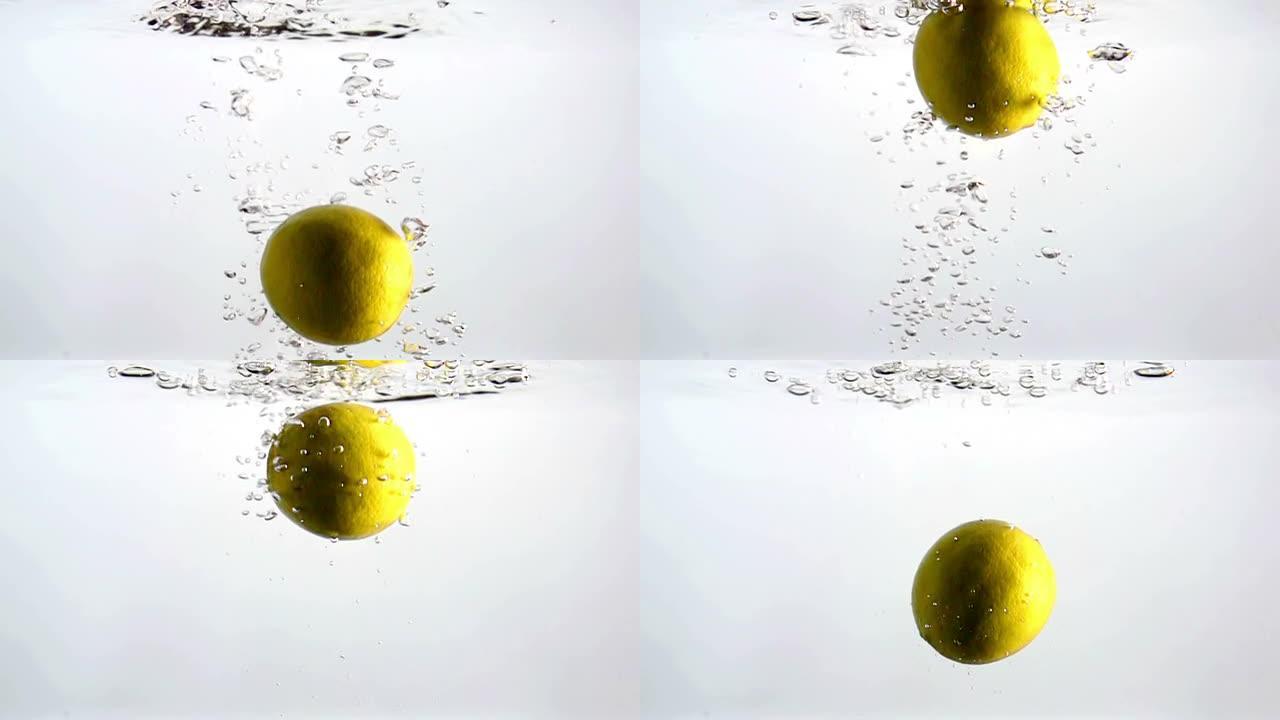 柠檬在清澈的水中落下慢动作