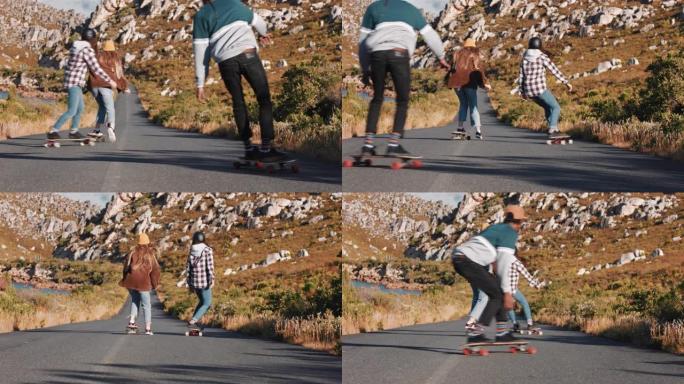 年轻的多民族朋友一起骑滑板在乡村道路上下坡巡航，享受轻松的暑假