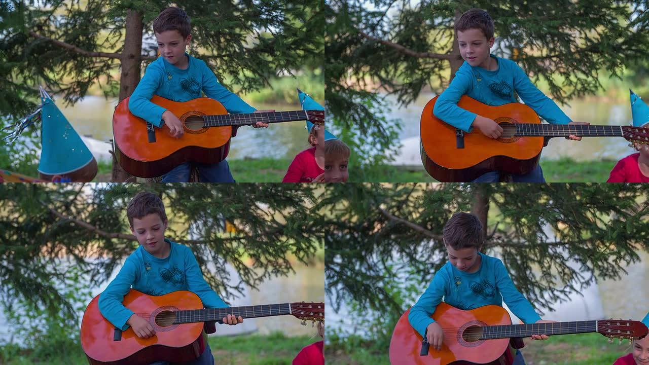 小男孩弹吉他