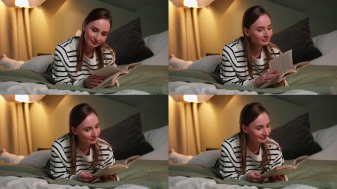 休闲与人的概念-年轻女子晚上在家在床上读书