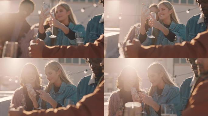 美丽的年轻女性朋友自拍照片使用智能手机享受屋顶派对在社交媒体上分享周末生活方式快乐庆祝友谊