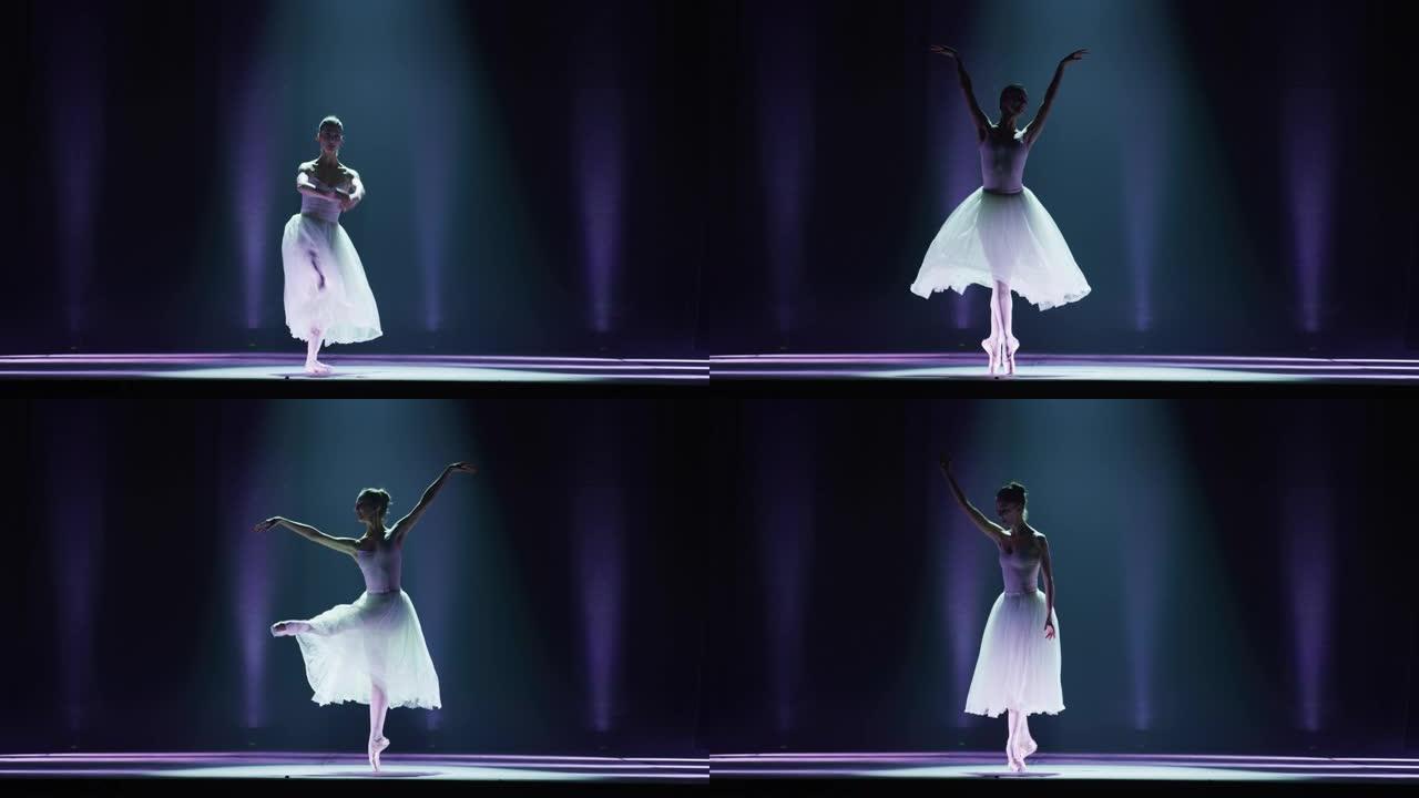 年轻优雅的古典芭蕾舞女舞者在剧院舞台上表演，并带有戏剧性的聚光灯照明。穿着白色芭蕾舞短裙的女人在表演