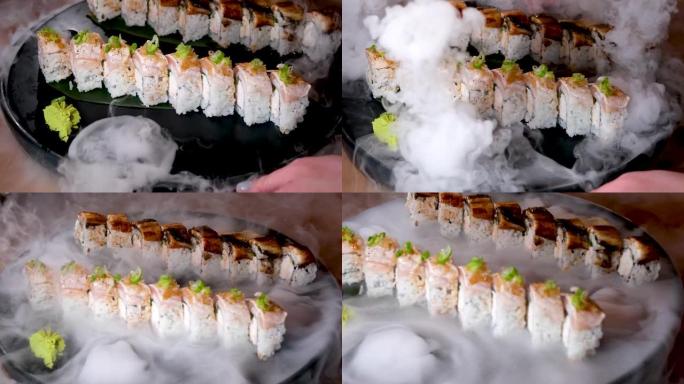在干冰蒸汽间歇泉上的寿司套装，在温哥华豪华酒店的餐厅里，美味的食物完美地供应着一团白烟，弥漫着忧郁的