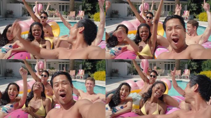 游泳池里的朋友年轻的亚洲男子用智能手机拍摄视频在社交媒体上分享暑假快乐的人在户外享受夏日4k