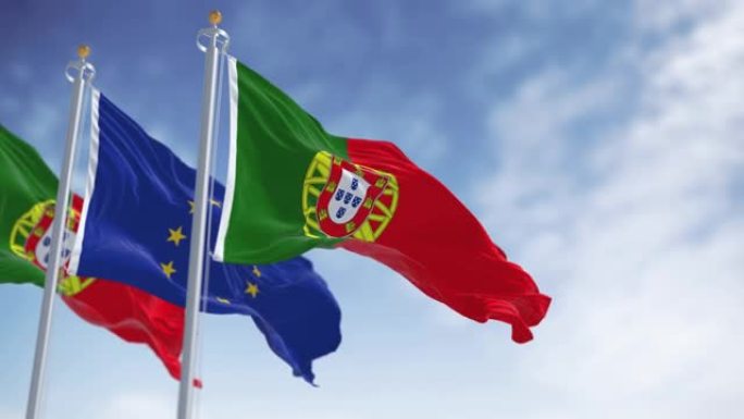 在一个晴朗的日子里，无缝循环的葡萄牙和欧盟旗帜的慢镜头