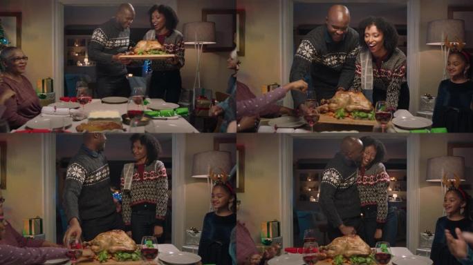 非裔美国人家庭圣诞节准备餐桌与火鸡庆祝节日团聚与朋友在家里享受盛宴4k镜头