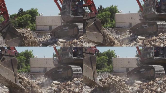 铲车挖掘机在施工现场掉落石块
