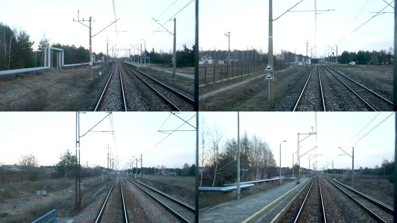从Przemysl到华沙的火车在春季或冬季经过各个村庄，没有下雪