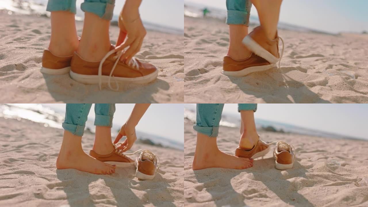靠近脚女人走在海滩上，脱下鞋子，享受温暖柔软的沙滩，探索暑假的生活方式
