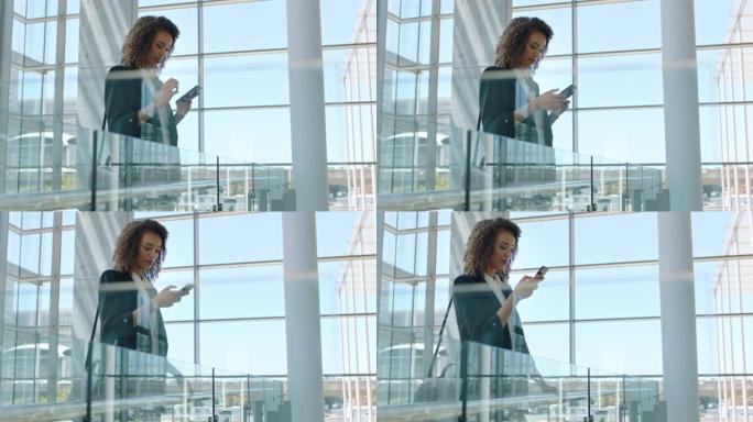 漂亮的商务女性用智能手机发短信浏览信息上网成功的女性高管在公司办公室用手机工作4k