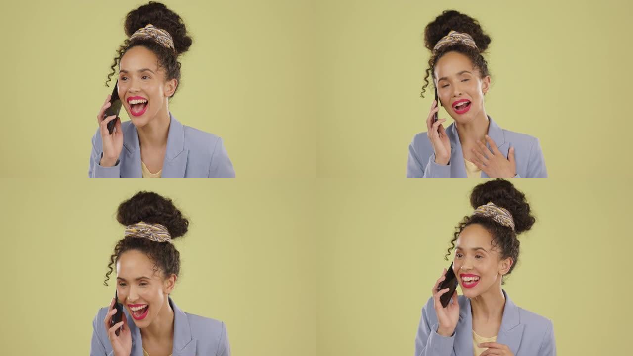 一个黑人妇女在绿色背景下的演播室里聊天的电话、好消息和八卦。与一个快乐的年轻女性聊天，交谈和微笑，接