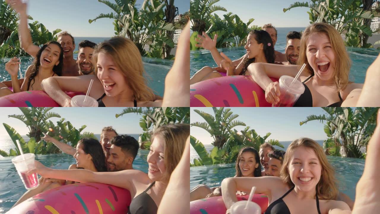 游泳池里有趣的朋友年轻女子用智能手机拍摄视频在社交媒体上分享豪华酒店度假村的暑假享受旅游假期4k