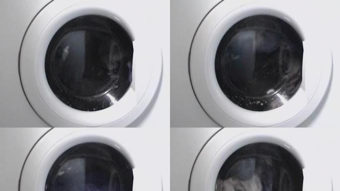 前装式洗衣机在其洗涤周期上运行