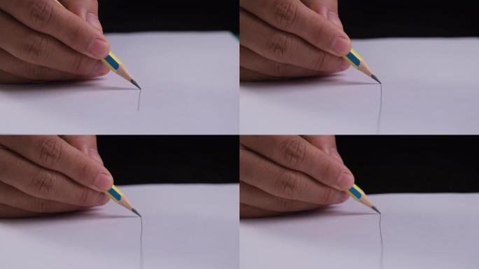 石墨铅笔在白色背景纸上绘制直线。艺术家用木制铅笔在纸上书写直线手绘。