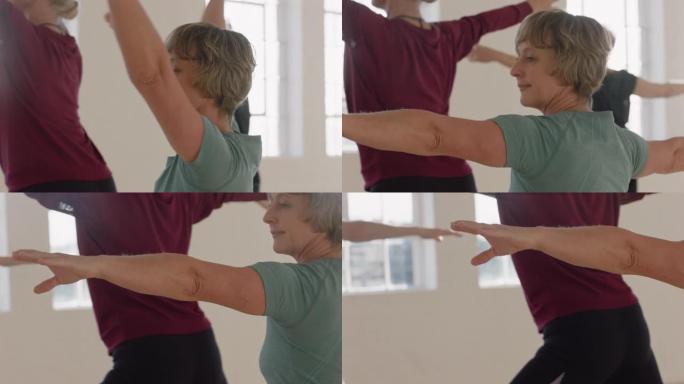 瑜伽课肖像成熟女性锻炼健康生活方式练习战士姿势享受工作室集体健身锻炼
