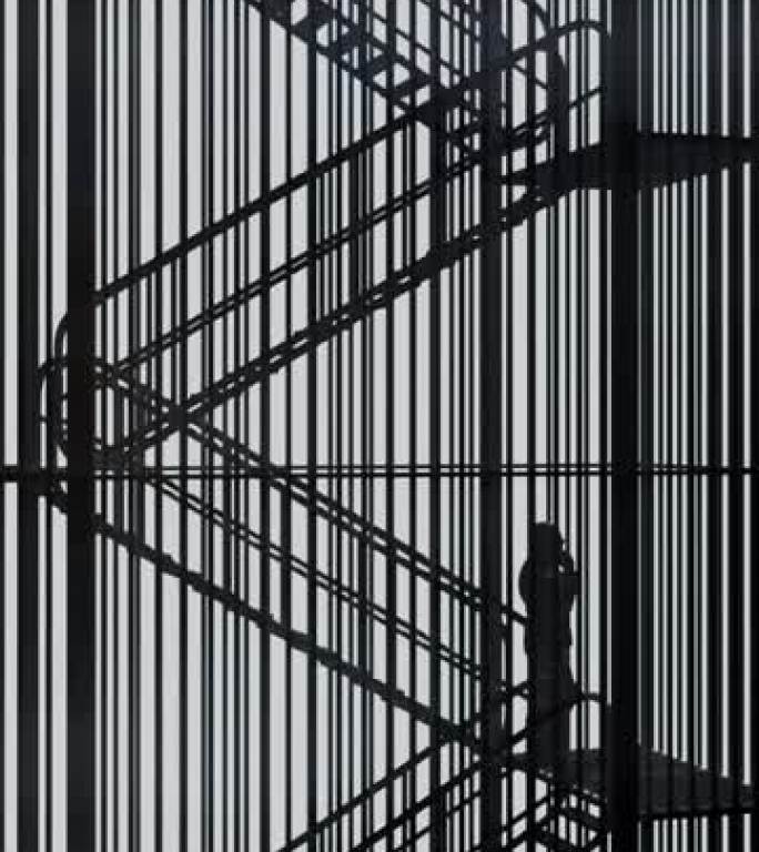 一个女人和一个男人站在无尽楼梯上的黑色剪影