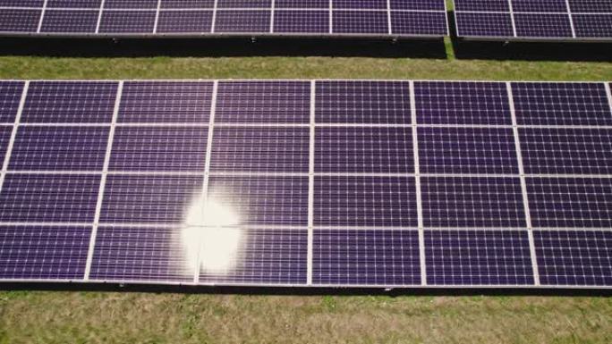 飞越野外电站的太阳能电池板。绿色能源和生态创新，保护自然，避免环境影响。光伏太阳能电池板技术