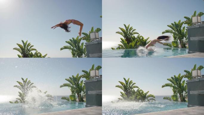 美丽的女人跳进游泳池做后空翻享受在热带度假胜地游泳，在温暖阳光明媚的日子里享受快乐的暑假地中海旅行4