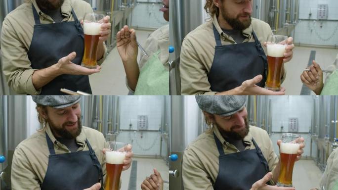 不同的酿酒师检查新鲜酿造的啤酒