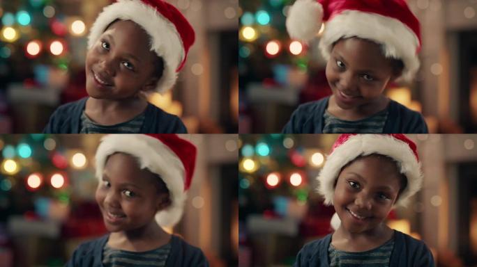 肖像小非洲裔美国女孩庆祝圣诞节戴着帽子微笑享受节日假期在家玩得开心4k